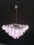 The chandelier is made of 52 discs of precious Murano glass are arranged on four levels. Nine E14 lights. Available four...