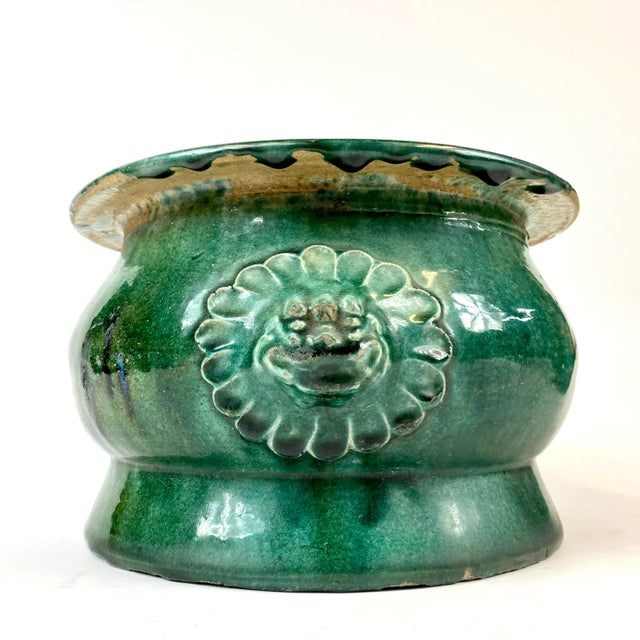 This planter has happy foo dogs on either side. On the inside of the planter, you’ll see the makers mark. Although this is...