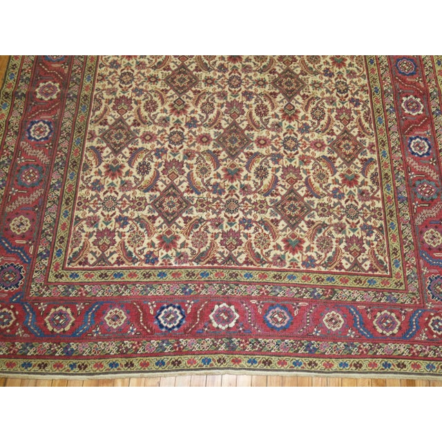 Emboldened by a symphonic palette of rarely found tones, this memorable 100-year-old gallery/corridor size antique Persian...