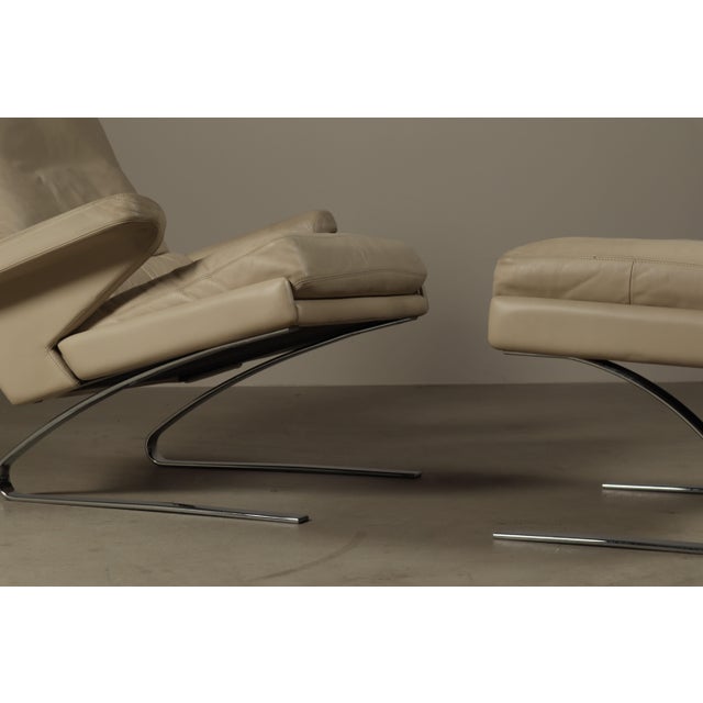 Leather "Swing" lounge chair with ottoman by Reinhold Adolf & Hans Jürgen Schröpfer for Cor Germany. Since the early...