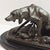 An exquisite example of 19th-century French Animalier art, this bronze sculpture entitled "Bitch with Pups" (Saintongeois...