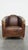 Offered this timeless and exclusive cowhide leather aviator designer armchair with a unique color scheme. This unique and...