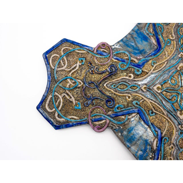 "Intreccio di Passione" is a unique Raku ceramic work, entirely hand-sculpted and decorated by artist Stefania Zoppellaro....
