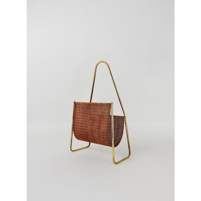 A beautiful modernist original and old newspaper stand / magazine rack from the 1950s. Model No. 3808. Designed and...