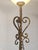 Add a touch of dramatic elegance to your space with this Art Deco torchiere floor lamp. Hand-forged from heavy wrought...