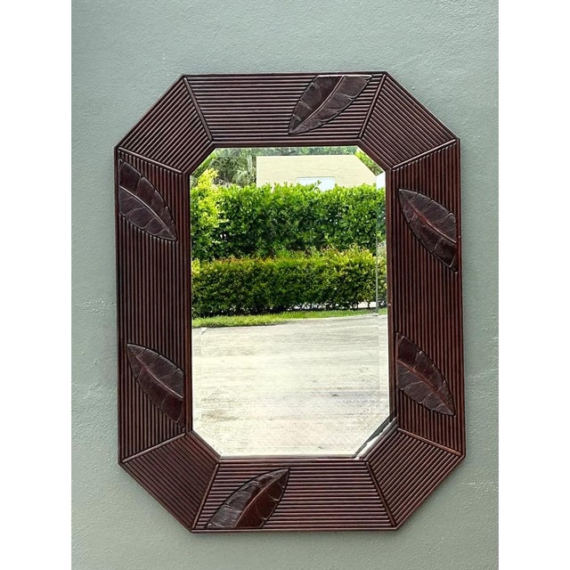 Showcasing refined geometric design infused with tropical allure, this vintage octagonal wall mirror features an imposing,...