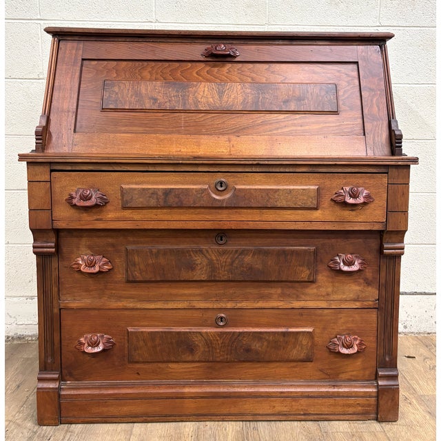 This is an absolutely gorgeous antique Victorian Eastlake secretary desk chest of drawers. It features beautiful burled...