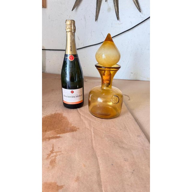 1960s Italian Art Glass Bottle with Large Blown Glass Stopper, Yellow-Orange Hue : This stunning 1960s Italian art glass...