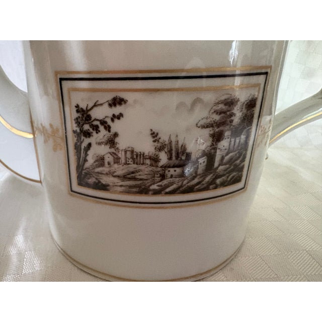 A Richard Ginori coffee pot in the Fiesole pattern. The coffee pot is marked "Made in Italy" and has the Richard Ginori...