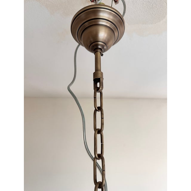 Scenographic italian hand-made chandelier withclear “tronchi”, elements of Murano glass. Huge chandelier in brunito-...