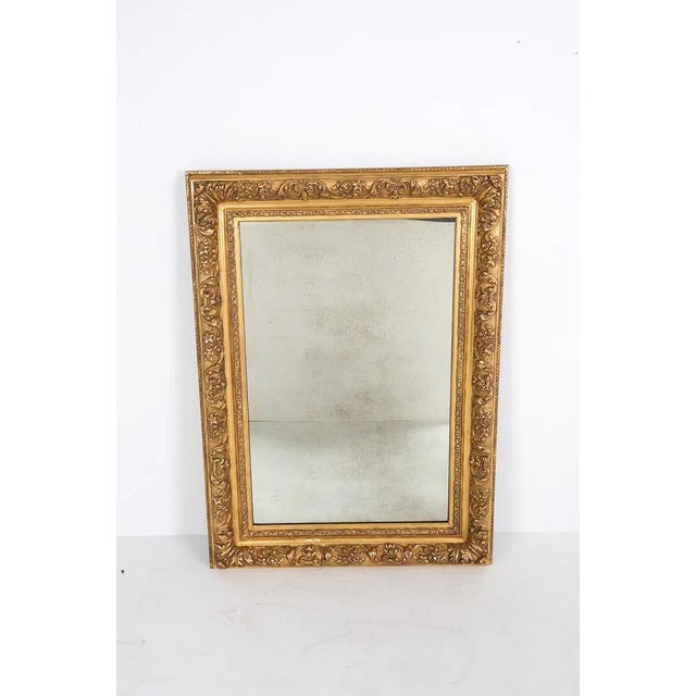 A beautiful and ornate Barbizon gilt frame fitted as a mirror. Allow this piece to bring a refined sense of 19th Century...