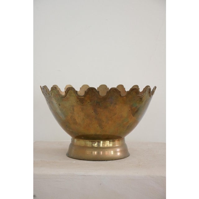 Beautiful scalloped solid brass bowl from India. Good vintage condition with some signs of wear. Bowl was NOT polished...