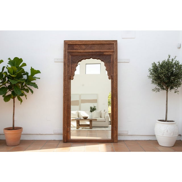 This is architectural grandeur at its finest. Standing at a breathtaking 116 inches tall, this monumental floor mirror...