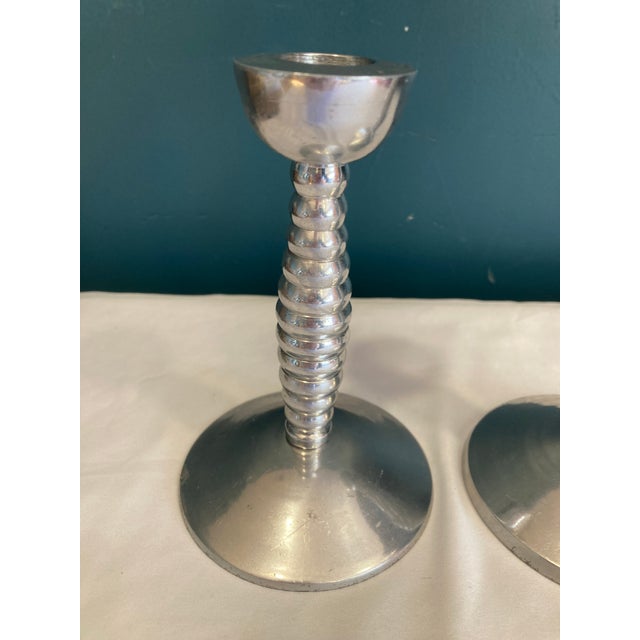 An exceptional pair among our vintage finds, these Metalworks by International candlesticks exemplify the sculptural...