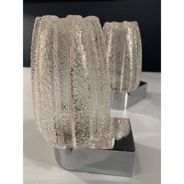 Mid-Century Ice Glass Wall Lights from Limburg, Set of 2, in Flawless conditions. Designed 1970 to 1979 This piece has an...