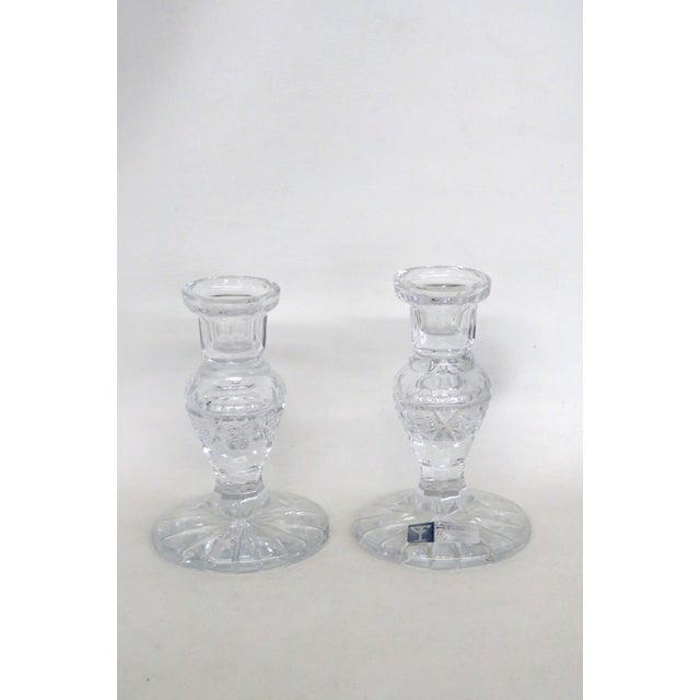 This beautiful pair of Candle Stick Holders are made of lead crystal. These stunning Candle Holders present a classically...