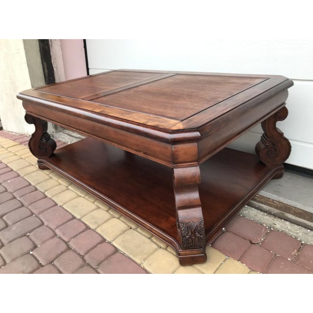 A large exclusive coffee table made of teak wood, signed with a burnt seal by Markor. Made entirely of wood. Good or even...