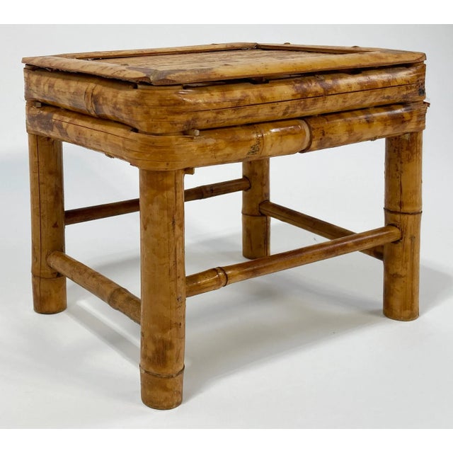 Vintage rectangular tortoise shell burnt bamboo rattan stand or riser. These are fabulous for plants, lamps, or as a...