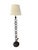 Elegant in its simplicity, this forged iron floor lamp showcases a distinctive off-center ring motif that lends an...