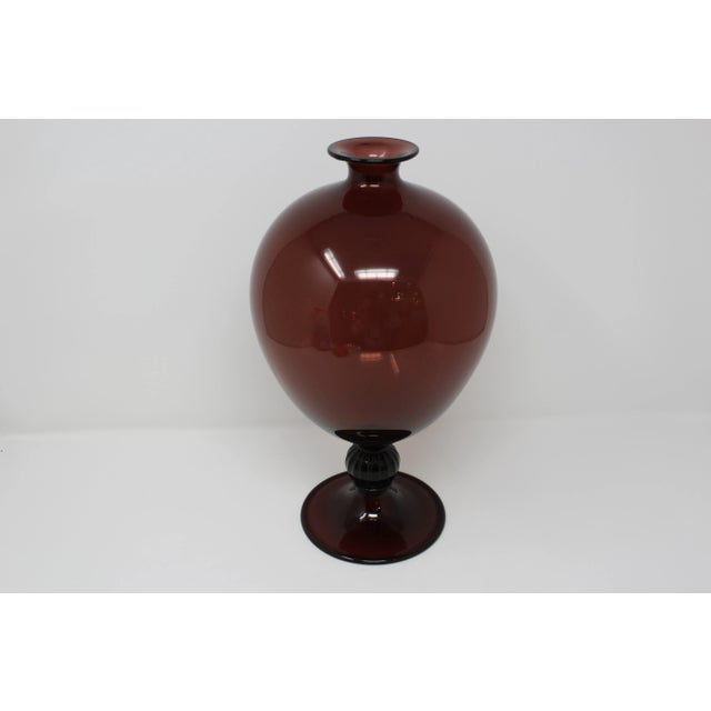 Hand blown in the furnaces of Glass Master Davide Fuin, this Murano Glass vase is the classic Veronese style. Priced well...