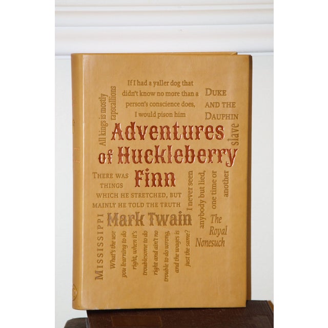 This version is a soft, caramel-colored, faux-leather bound book of the classic story of Huckleberry Finn, the boy who...