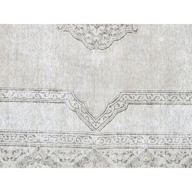 1960s Persian Kerman Rug. Hand woven in the Kerman region of Iran. Distressed and refinished in the U.S. The Persian...