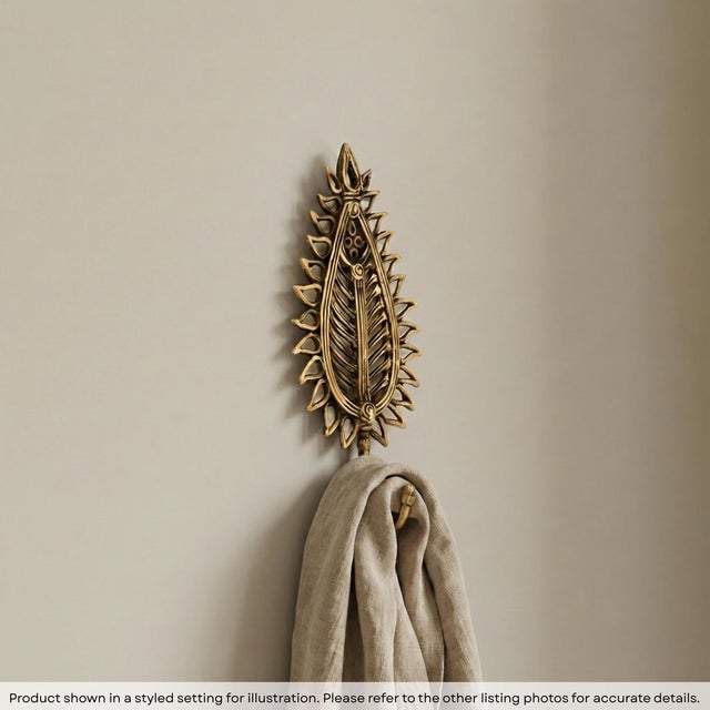 Bring a touch of nature’s organic elegance into your home with our Brass Leaf Wall Hook. This exquisite piece of leaf...