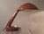 Bakelite lamp with glass base by LBL. Often attributed to Marianne Brandt; however, this is not documented. Exceptional,...