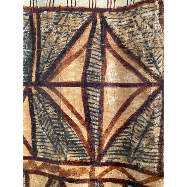 Make a striking statement with this large vintage Fijian masi (tapa) cloth, beautifully hand painted with bold geometric...