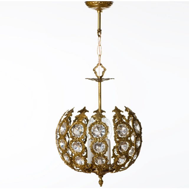 Vintage brass and crystal open globe pendant light with three illumination. Spain, circa 1960s. Priced each. This light...