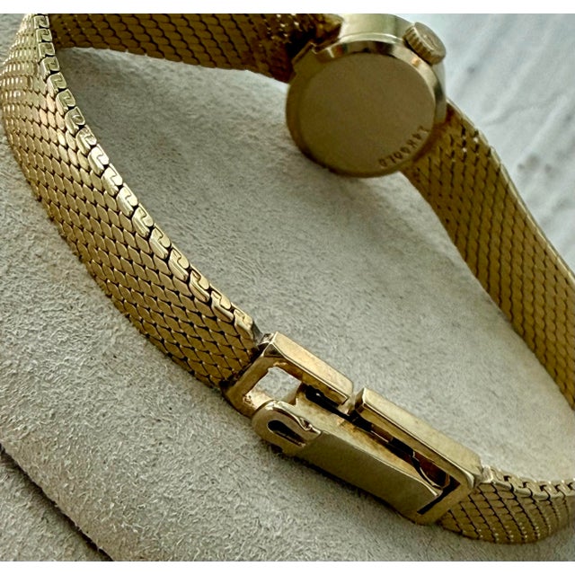Rare Vintage 14 Karat Gold Ladies Omega Dress Wristwatch, Circa 1968 With Manual Wind-Up & Woven Gold Mesh Band by Premier Swiss Maker Omega For Sale - Image 11 of 12