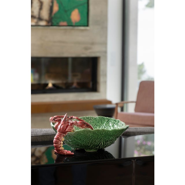 There are several decorative pieces created by Raphael where cabbage leaves, hampers with turnips and garlic, onions,...