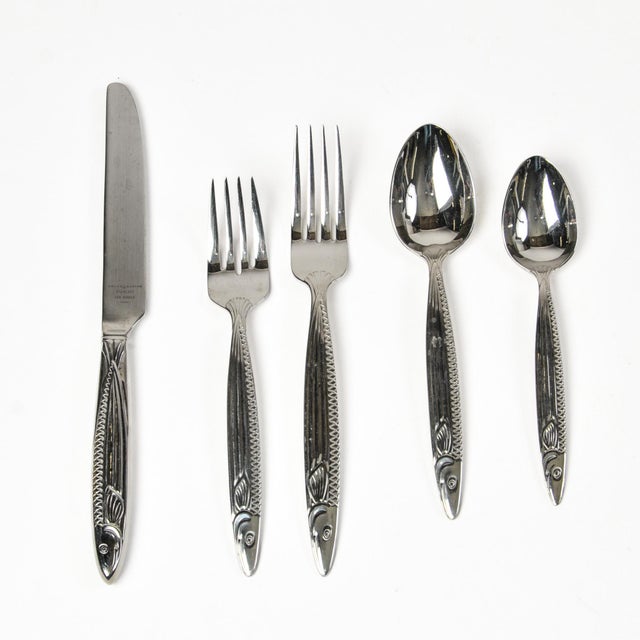 RARE fish handle stainless flatware service for four by Reed and Barton called "Pisces" design. The perfect way to take...