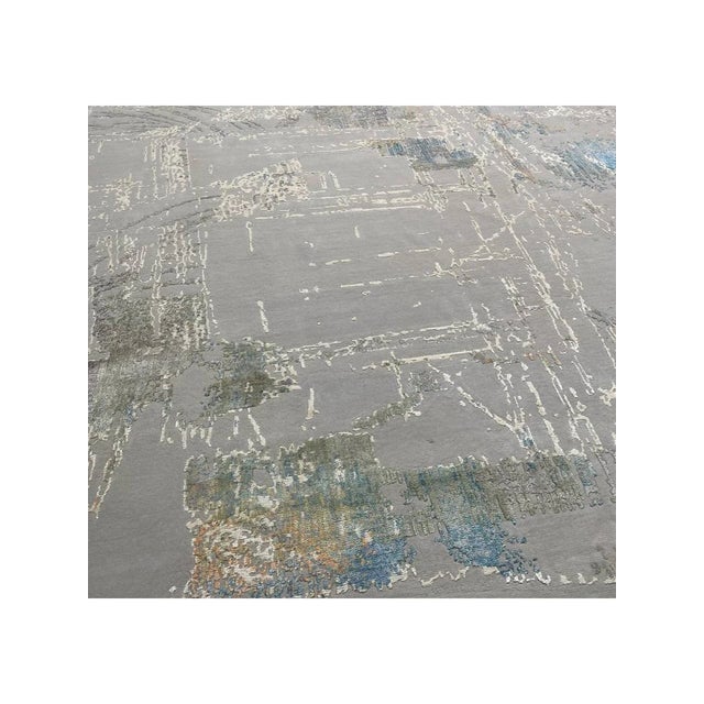 Exact Size: 12'1" x 15'3" Color: Gray Age: New Materials: Wool, Bamboo Silk Construction: Hand Knotted Origin: India