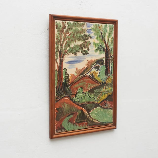Ceramic hand painted artwork of a colorful landscape by Catalan artist Diaz Costa, circa 1960. Framed. In original...
