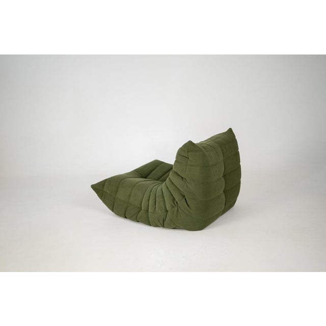 This Togo has been reupholstered with new foam and high-quality new fabric, keeping its inner structure, giving the item...