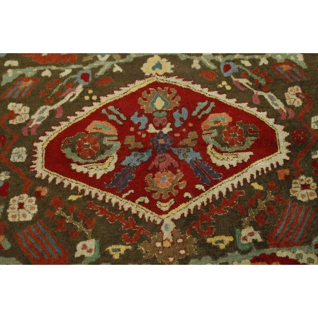 Handmade in premium wool and originating circa 1920-1929, this 4x5 antique German Tetex rug joins Rug & Kilim’s Antique...