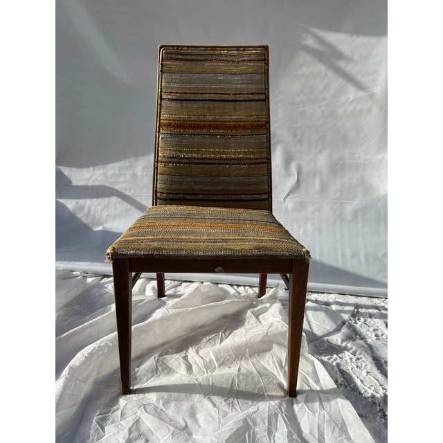A single Merton Gershun for Dillingham Furniture walnut dining side chair with woven upholstered seat and back.