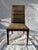 A single Merton Gershun for Dillingham Furniture walnut dining side chair with woven upholstered seat and back.