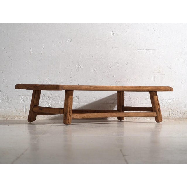 Antique low table in pine wood, traditional chinese furniture originating from northern china and dated circa 1930....