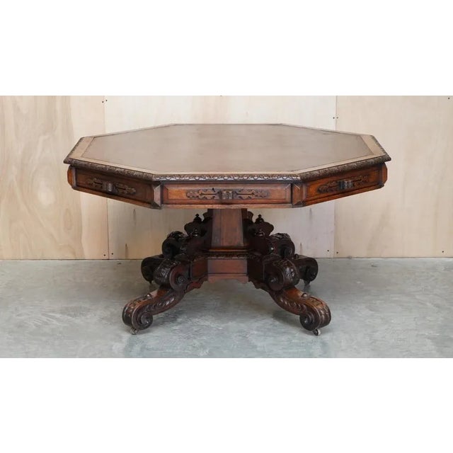Stunning Antique Gothic Revival Rent table with hand carved Lions heads A very good looking well made and decorative...