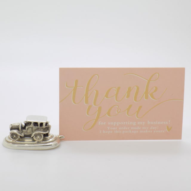 Original vintage table accessory shaped as a car, handmade in Italy between the 1970s and 1980s in genuine Italian silver....