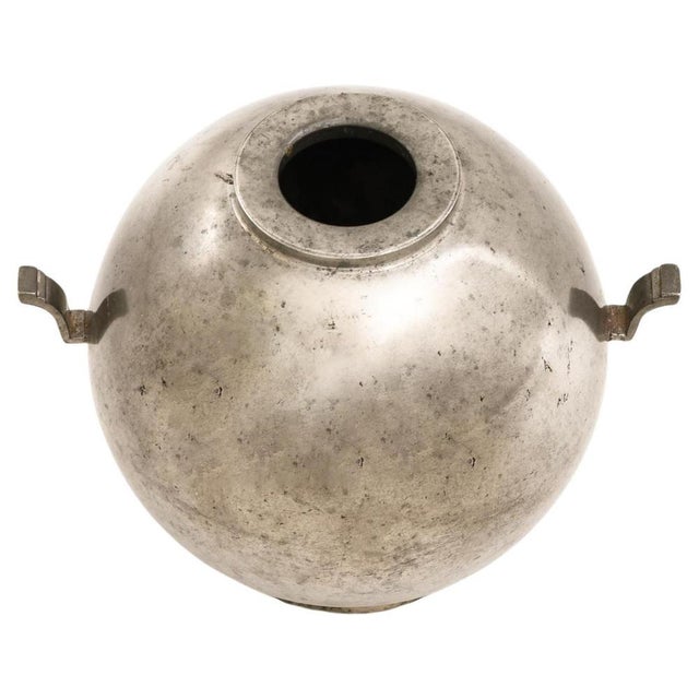 This rare pewter vase, designed by folke arström and produced by edlunds silverfabrik in sweden in 1933, showcases a...