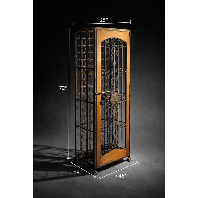 A commanding and highly functional statement piece, this vintage wine cabinet combines warm solid wood with sculptural...