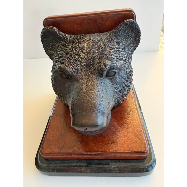Pair of vintage Maitland-Smith Bear bookends. Naturalistic cast bronze bear heads. Mounted to leather/wood base and back...