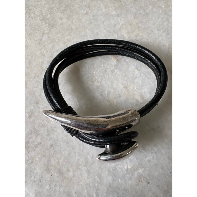 Vintage sterling silver and leather strap bracelet.