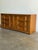 Crafted from high-quality oak wood, this dresser showcases a rich, warm finish with beautiful natural grain patterns. The...