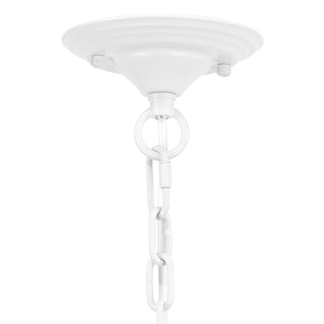 Our Large Porous Pendant allows subtle light to pass through its pierced silhouette. As light escapes the rough, weathered...