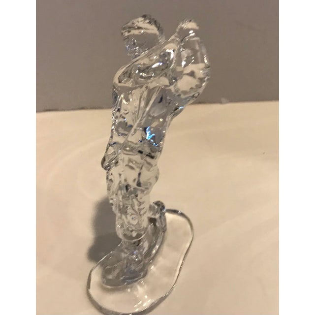 Waterford male golfer in full swing figurine. Stands 7” tall Acid etched on bottom. Pristine condition.