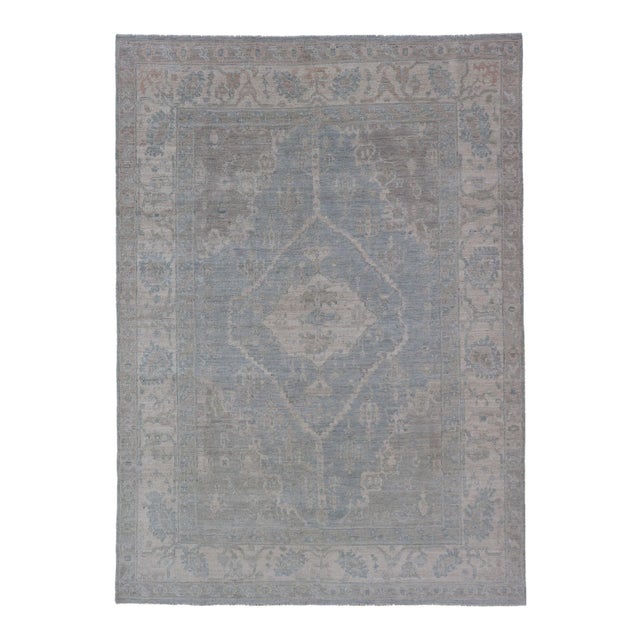 Modern Oushak With a Light Blue-Gray Background With Medallion & Tribal Motifs 5'10"x8'9" For Sale